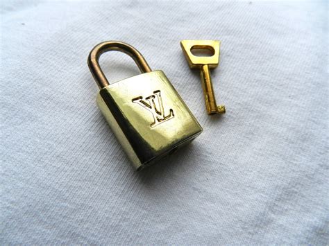 louis vuitton silver padlock|louis vuitton lock it tote.